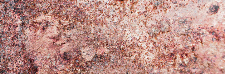 Banner of a rusted and weathered blue metal surface with peeling paint and corrosion