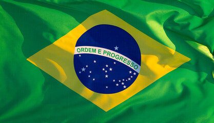 Obraz premium national flag of Brazil flutters in the wind
