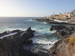 Rocky bay with blue ocean in Tenerife, los Gigantes