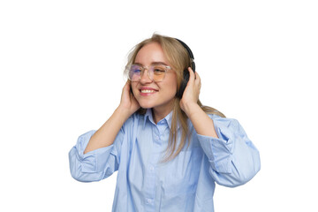 Woman enjoying music while wearing headphones in a bright, minimalist setting