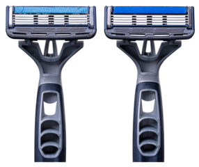 Disposable razor on isolated background. New and dirty disposable razor.