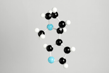 Chemical model of molecule on light grey background