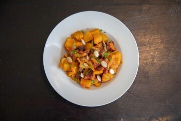 Traditional dried meat with pumpkin known in Brazil as jabá com jirimum