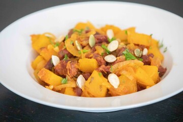 Traditional dried meat with pumpkin known in Brazil as jabá com jirimum