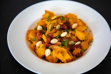 Traditional dried meat with pumpkin known in Brazil as jabá com jirimum