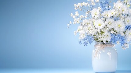 A vase of flowers sits on a blue background