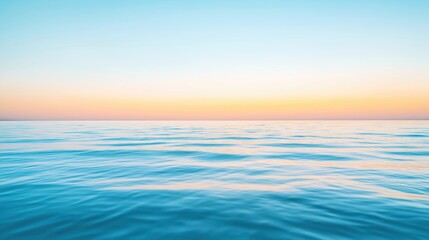 Obraz premium Calm Ocean Horizon at Sunset: Tranquil Waters and Idyllic Sky Scenery