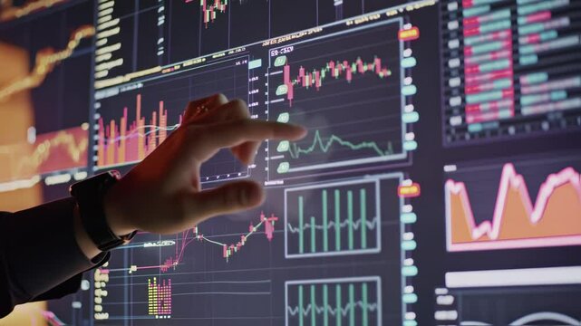Finance professional examines real time stock market data, navigating interactive charts on a multi screen setup, showcasing the fast paced world of investment analysis