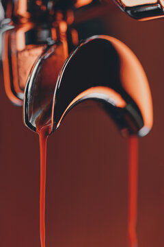 Close-up of Espresso Flow from Portafilter Spout