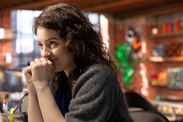Stock market investor monitors charts and candlestick patterns and being pleased, watching the...