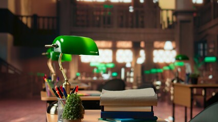 Empty vintage library featuring wooden shelves and classic green lamps, old fashioned elegant furniture create a serene study space to inspire learning and intellectual growth.