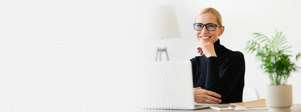 A confident woman is engaged in work at her modern desk. She wears stylish glasses and a black turtleneck. A vibrant plant adds life to her well organized workspace in a bright room, copy space
