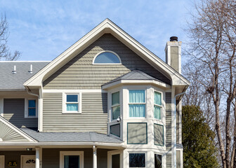 Elegant gable-roofed home with a charming bay window in Brighton, Massachusetts, USA
