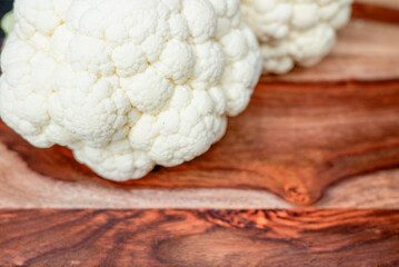 Fresh cauliflower on a wooden background