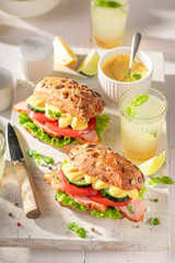 Healthy sandwich with curry chicken, chive and cheese.
