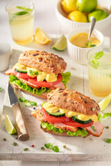 Homemade sandwich with curry chicken, lettuce and tomato.