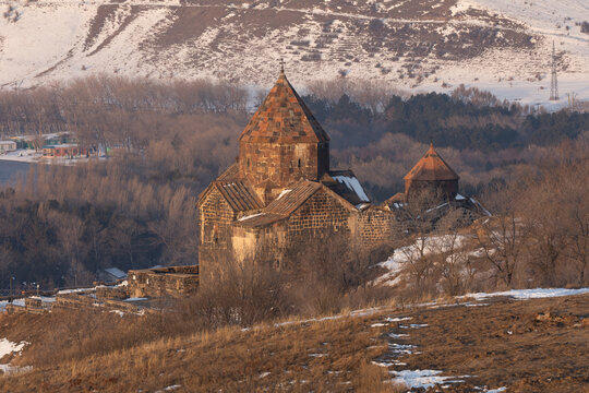 Sevanavank Monastery on the Sevan Peninsula during a cold early winter morning, at sunrise, overlooking the vast Lake Sevan. One of Armenia&rsquo;s most popular travel and cultural destinations