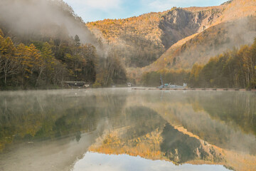Landscape Views Of Taisho Pond Trail With Autumn Leaves And Morning Fog Along Azusagawa RiverAt Kamikochi, Chubu Sangaku National Park, Nagano, Japan 