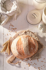 Hot and fresh round loaf bread baked in home bakery.
