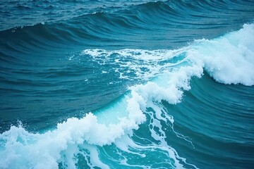 Rolling blue sea, frothy whitecaps, textured surface , tide, water, sun