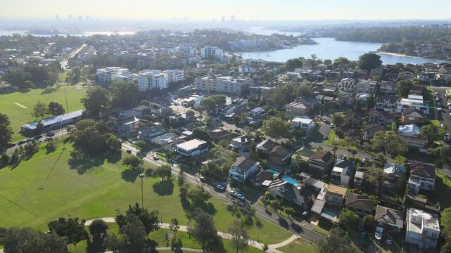 Aerial drone footage capturing sunset over Chiswick and Abbotsford showcasing the Parramatta River in the background.