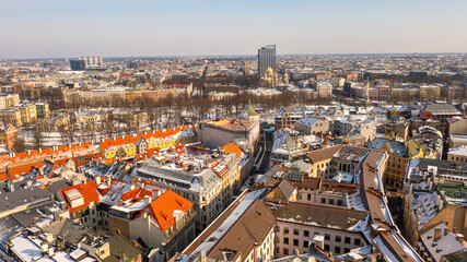 Obraz premium Riga, Latvia, Beautiful panoramic aerial photo from drone to Old Riga on a beautiful sunny winter day. (series)