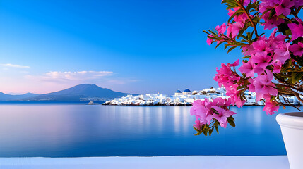 Santorini Sunset Panorama: Pink Flowers Frame Blue Domes and Sea © PPS