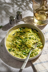 Creamy garlic zucchini noodles (zoodles) served as a healthy low-carb pasta alternative