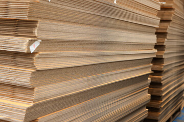Paper factory process texture carton industry brown cardbox. container cardboard for packing, Pile...