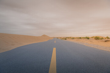 An empty highway going through the desert, Inner Mongolia, China