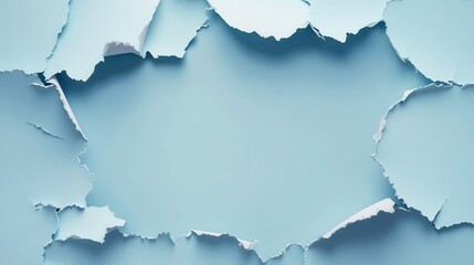 A close up view of torn paper revealing a space