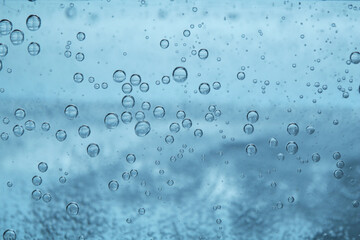Refreshing soda water as background, closeup view