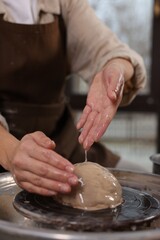 Hobby and craft. Woman making pottery indoors, closeup