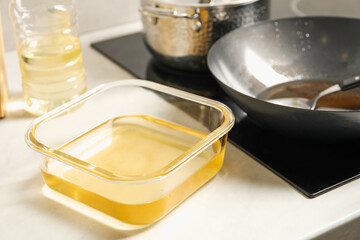 Used cooking oil in kitchen, closeup view