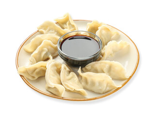 Tasty boiled gyoza (dumplings) with soy sauce on white background
