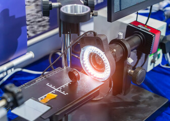 Experiment with lens device in optical laboratory