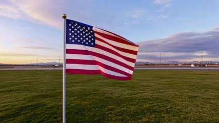 Waving american flag against a serene landscape at dusk - Powered by Adobe