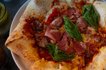 Pizza stella napoletana, a traditional star-shaped pizza from Naples or Napoli, Italy. Added with...