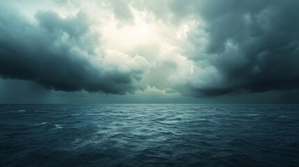 Obraz premium a stormy sea with dark clouds overhead.