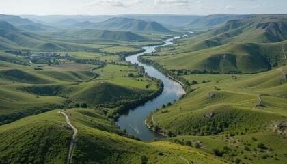 Fototapeta premium Breathtaking Aerial View of River Amidst Lush Green Hills Landscape