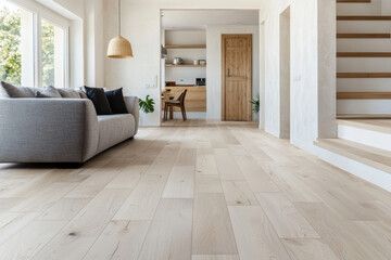 Whitewashed flooring gleams, filling spacious room with sense of calm