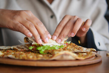 woman Preparing fresh turksih Lahmacun 