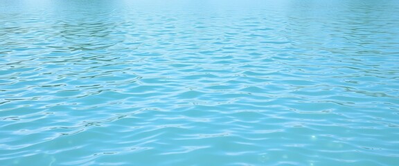 Obraz premium Calm light blue Florida river water, gentle waves ripple across surface, natural lush background, light blue, sunlit