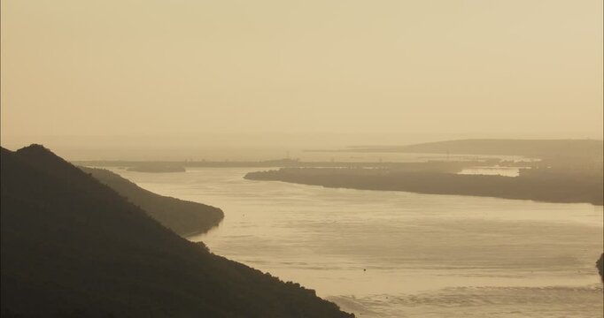 Majestic confluence of Volga river at Strelnaya mountain in golden hour