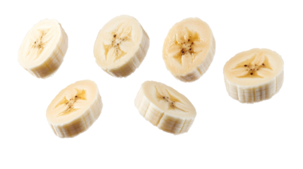 Perfectly sliced banana pieces levitating on a clean white background with a modern minimalistic aesthetic