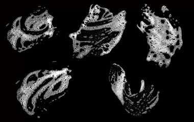 Set collection foam white on a black background, Top view white foam soap or shower gel is divided...