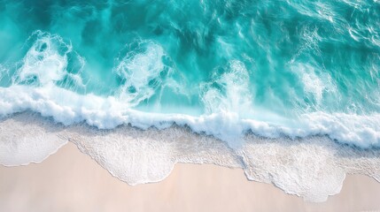 Obraz premium Turquoise waves gently kiss the sandy shore, embodying the serene essence of summer.