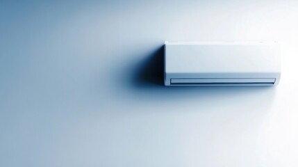 Obraz premium A sleek wall-mounted air conditioning unit designed for efficient cooling in a contemporary indoor environment, showcasing a minimalist style