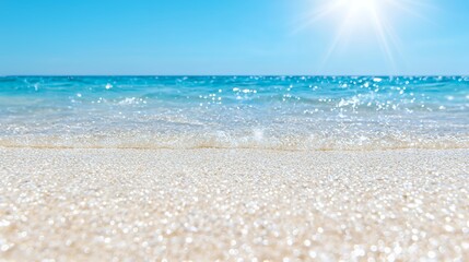 Gentle Wave Lapping on Sandy Beach with Bright Sunlight and Clear Sky
