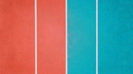 A vibrant image of a running track featuring red and turquoise lanes separated by white lines, inviting athletes and fitness enthusiasts.